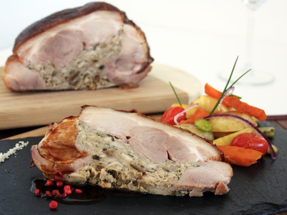 Shoulder of suckling pig stuffed with cep mushrooms, with meat juice and heritage vegetables - 