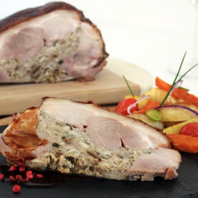 Shoulder of suckling pig stuffed with cep mushrooms, with meat juice and heritage vegetables - 